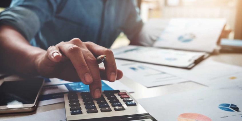 Calculating the cost of a warehouse construction project