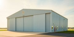 Airplane hangar building for light aircraft