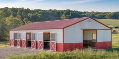 Three stall horse barn in red and white
