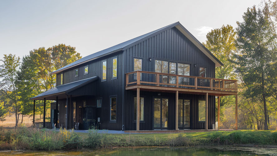 black 2 story barndominium