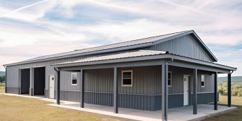 30x70 hybrid garage/shop building with two parking bays, a covered porch, and gray steel siding, ideal for workshops or farm storage