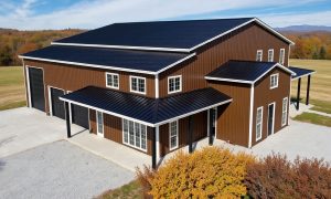 Modern 5,000 sq ft barndominium, two story in coco brown and white trim
