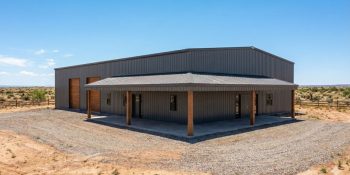 Low angle shot of a modern barndominium shop house in black