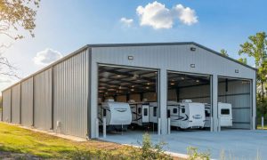 Large commercial motorhome storage building in gray