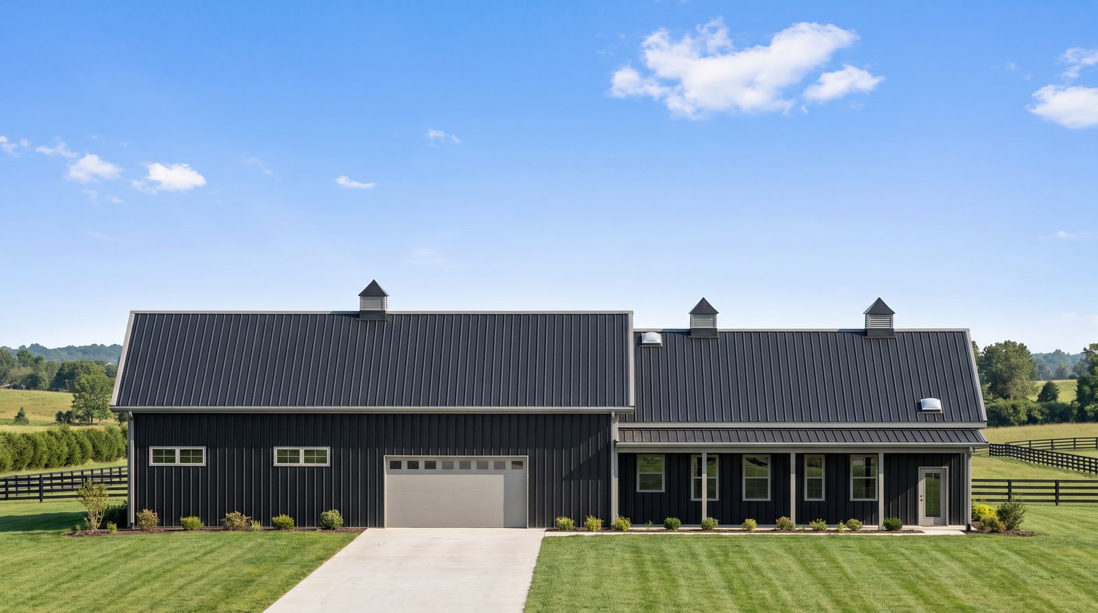 The Forge 50×95 barndominium front elevation (south on the plan), photoreal render: 5:12 gable, the 40 foot front porch, three cupolas and one overhead door into the 2-car garage