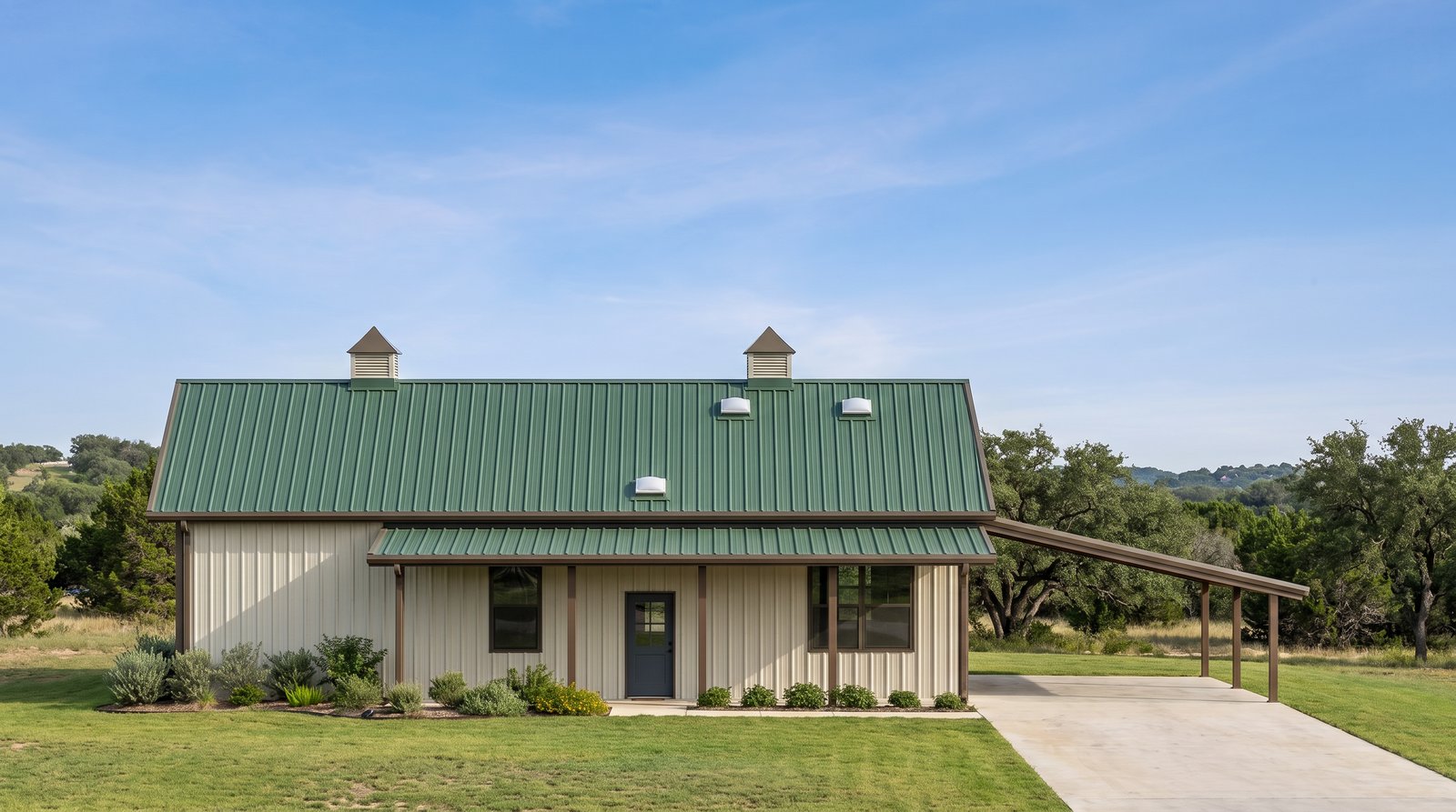 The Grove 50×50 barndominium front elevation (south on the plan), photoreal render: 4:12 gable, the 36 foot front porch and two cupolas